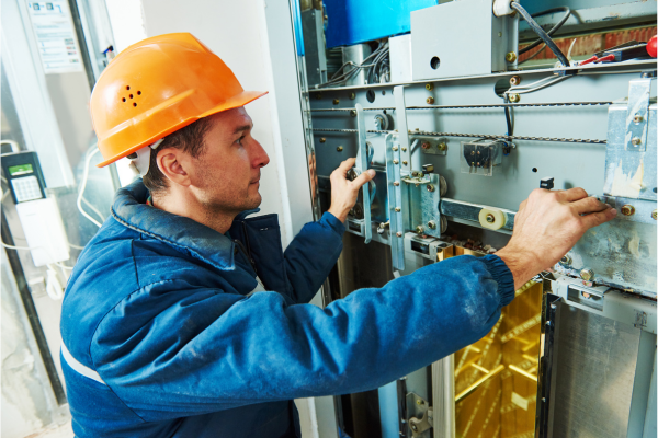 Image of a technician installing a residential elevator product